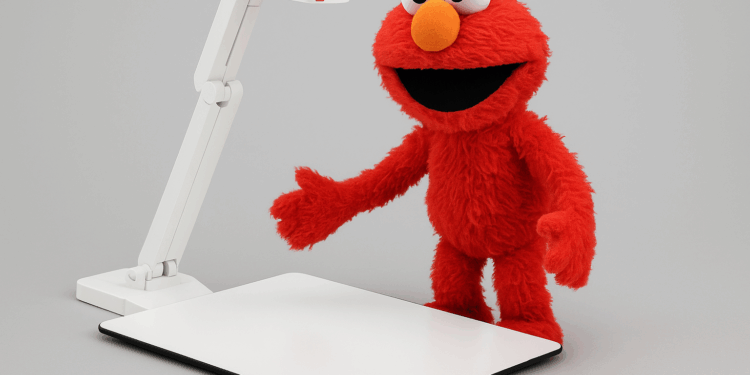Elmo character using an ELMO document camera in a courtroom setting