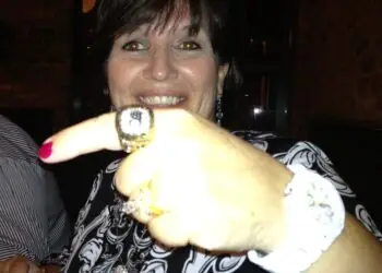 Betty Oakes showing a Philadelphia Flyers Stanley Cup championship ring at the FDCC Rittenhouse Hotel dinner in Philadelphia.