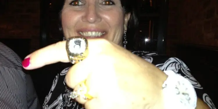 Betty Oakes showing a Philadelphia Flyers Stanley Cup championship ring at the FDCC Rittenhouse Hotel dinner in Philadelphia.