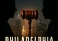 Cinematic-style image of two silhouetted attorneys facing opposite directions with a gavel between them and the Philadelphia skyline glowing in the background, representing the real case that inspired the movie Philadelphia.