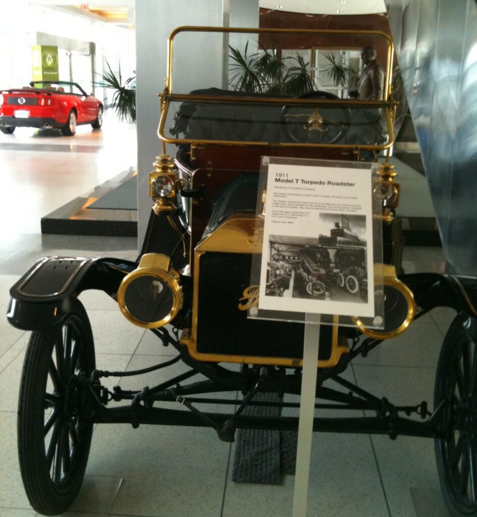 Front view of a 1911 Ford Model T Torpedo Roadster displayed at Ford Motor Company World Headquarters in Dearborn, Michigan.